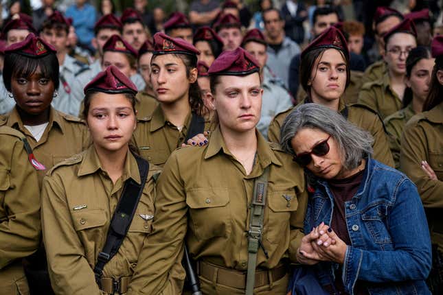 Israeli soldiers mourners in grief during the funeral of Israeli solider Staff sergeant David Sasson, in Netanya, Israel, Thursday, March 7, 2024. Sasson, 21, was killed during Israel&#39;s ground operation in the Gaza Strip, where the Israeli army has been battling Palestinian militants in the war ignited by Hamas&#39; Oct. 7 attack into Israel. (AP Photo/Ariel Schalit)