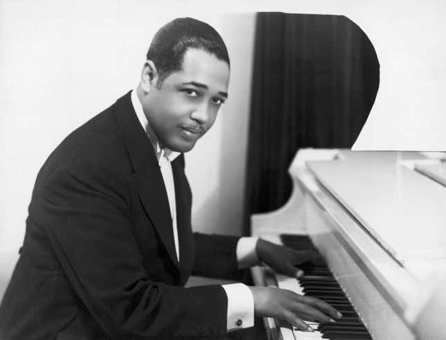 Duke Ellington (Edward Kennedy; 1889-1974), American composer and arranger, at the keyboard. Half-length photograph, 1910&#39;s.