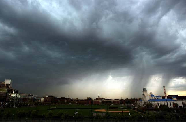 Tornado funnels in a storm over Denver, Colorado.