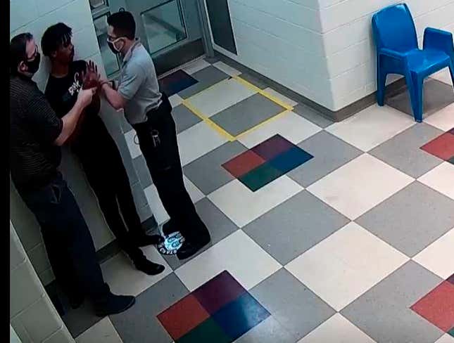 This still image from a security camera provided by Sedgwick County shows Cedric Lofton talking with staff on Sept. 24, 2021 at the Sedgwick County Juvenile Intake and Assessment Center in Wichita, Kan.