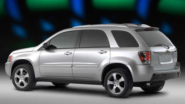 A photo of a silver Chevrolet Equinox SUV. 