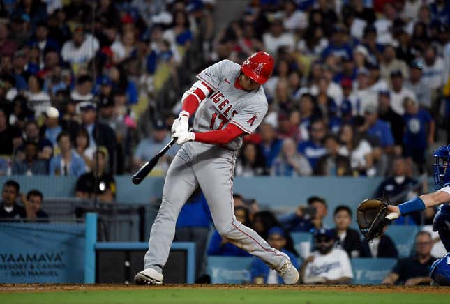 LOS ANGELES, CALIFORNIA - JULY 8: Shohei Ohtani #17 of the Los Angeles Angels a two run home run to score Andrew Velazquez #4 against pitcher pitcher Michael Grove #78 of the Los Angeles Dodgers during the seventh inning at Dodger Stadium on July 8, 2023 in Los Angeles, California. (Photo by Kevork Djansezian/Getty Images)