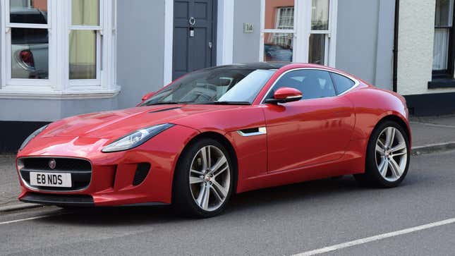 A red Jaguar F-Type 3-litre Coupe, built 3014 onwards. at Usk, Gwent, Wales, 2 June 2018.