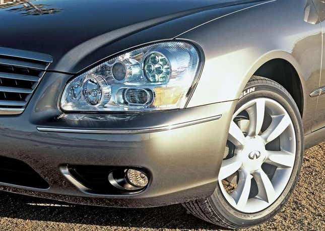 Close-up of the Infiniti Q45's gatling gun style headlights