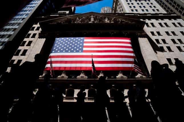 FILE - People walk past the New York Stock Exchange on Wednesday, June 29, 2022 in New York. Wall Street&#39;s best week of the year is getting even better Friday, Nov. 3, 2023, following a cooler-than-expected report on the job market. (AP Photo/Julia Nikhinson)