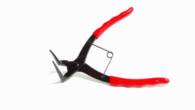 A photo of a pair of snap ring pliers with bright red plastic handles. 