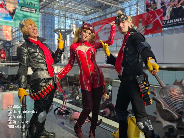 A trio of Persona 5 cosplayer strike a pose at Anime NYC 2023.