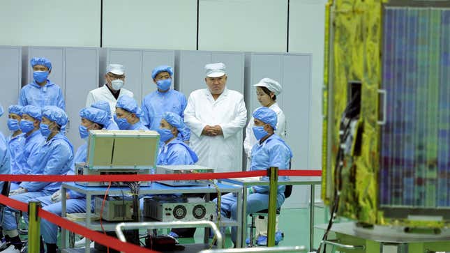 North Korean leader Kim Jong Un and his daughter Kim Ju Ae meet with members of the Non-permanent Satellite Launch Preparatory Committee, as he inspects the country's first military reconnaissance satellite, in Pyongyang, North Korea May 16, 2023, in this image released by North Korea's Korean Central News Agency on May 17, 2023. 