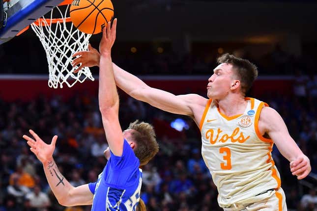 Tennessee guard Dalton Knecht (3) blocks Creighton guard Baylor Scheierman (55) during a NCAA Tournament Sweet 16 game between Tennessee and Creighton held at Little Caesars Arena in Detroit on Friday, March 29, 2024.