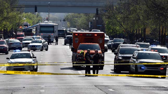 Louisville metro Police stand guard outside of the Old National Bank building in Louisville, Ky., Monday, April 10, 2023.