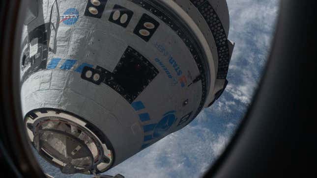 A photo of the Boeing Starliner craft docking with the ISS.