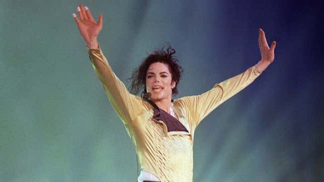 Michael Jackson preforms before an estimated audience of 60,000 in Brunei on July 16, 1996.