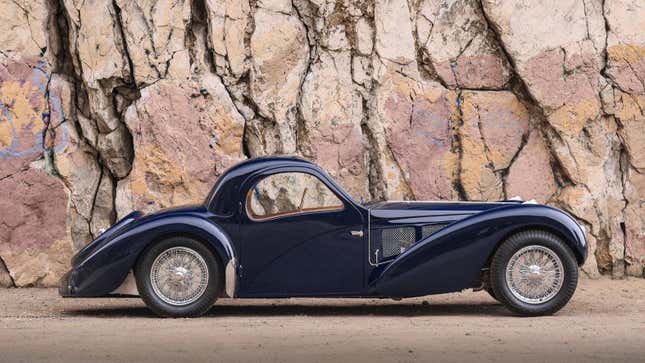 Side view of a dark blue 1937 Bugatti Type 57SC Atalante