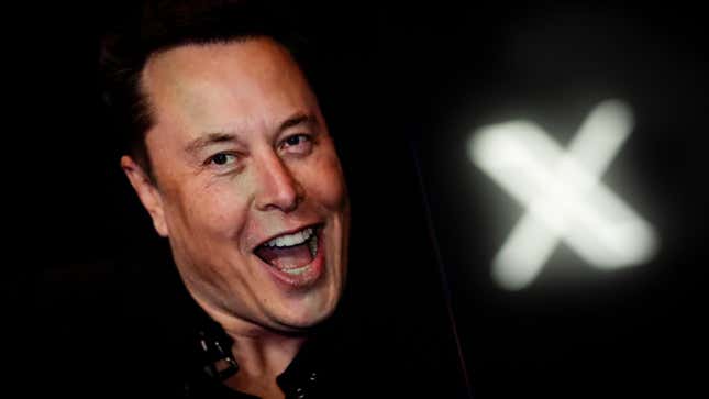 An image of Elon Musk is seen displayed on a mobile device with the Twitter and X logos in this illustration photo on 15 November, 2023.