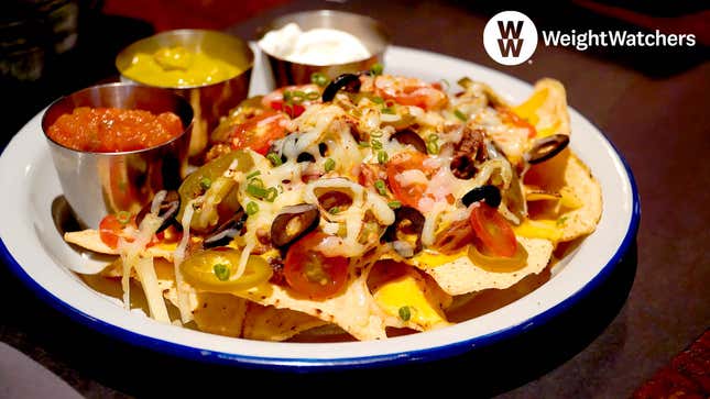 Image for article titled Weight Watchers Announces They Went Totally Ham On Some Nachos Last Night And That’s Okay