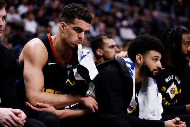 May 6, 2024;  Denver, Colorado, USA;  Denver Nuggets forward Michael Porter Jr. (1) and guard Jamal Murray (27) on the bench in the fourth quarter against the Minnesota Timberwolves during game two of the second round for the 2024 NBA Playoffs at Ball Arena.