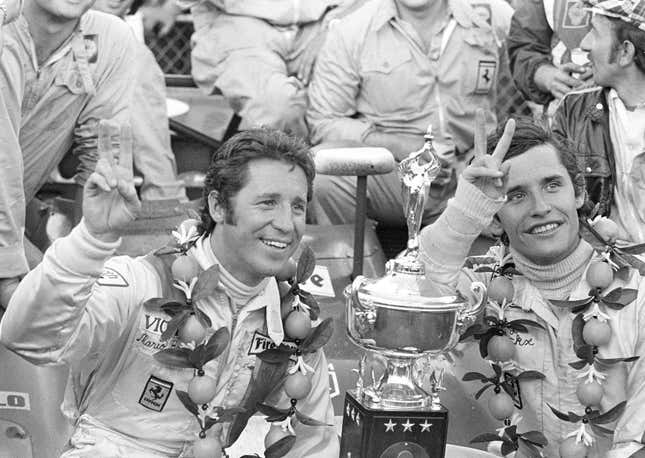 Mario Andretti (left) and Jacky Ickx (right) after winning the Six-Hour Daytona Continental endurance race in 1972.