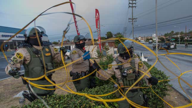 Image for article titled After Killing Citizens, the Los Angeles Police Reportedly Also Harasses Their Families at Vigils