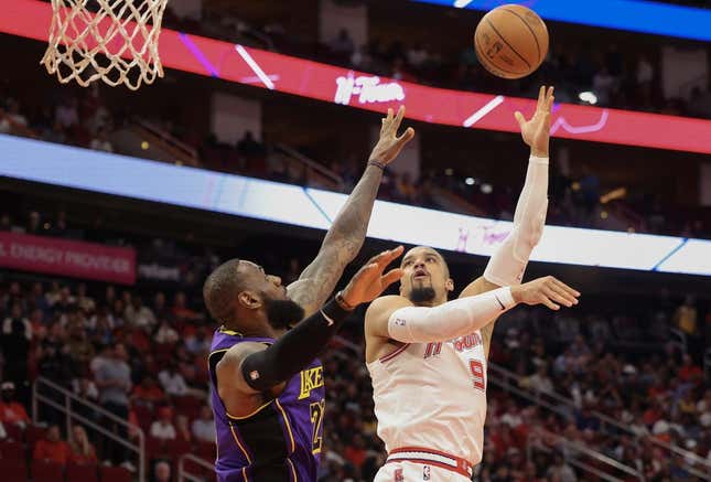 Nov 8, 2023; Houston, Texas, USA; Houston Rockets forward Dillon Brooks (9) shoots against Los Angeles Lakers forward LeBron James (23) in the first quarter at Toyota Center.