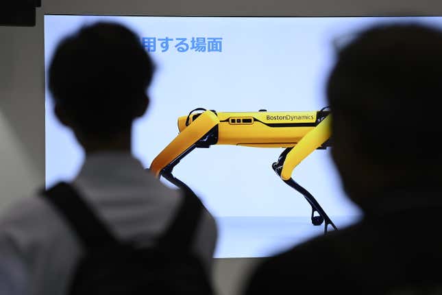 Visitors attend the Tokyo Robot Week in Tokyo, Japan.