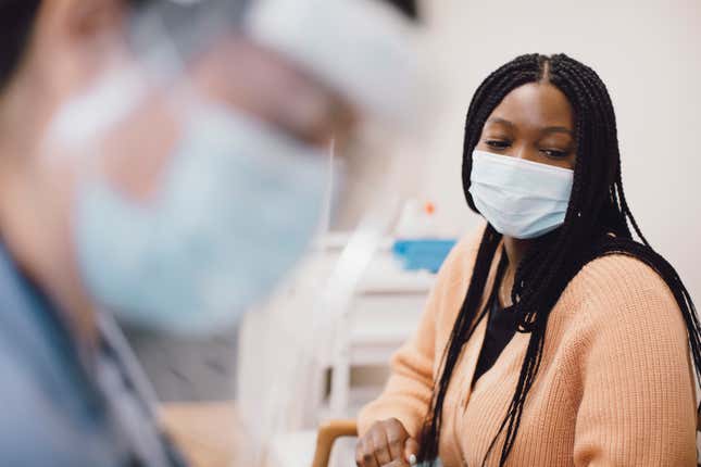 Black woman at doctor