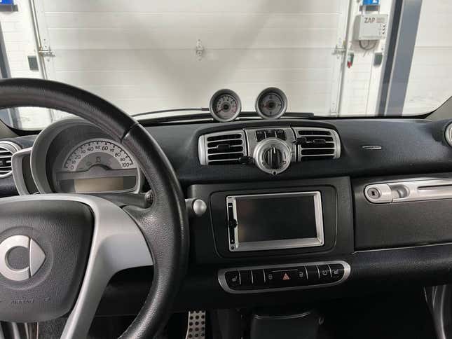 Image for article titled At $9,800, Does This 2013 Smart ForTwo Brabus Measure Up?