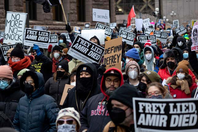 People march at a rally for Amir Locke on Saturday, Feb. 5, 2022, in Minneapolis. 