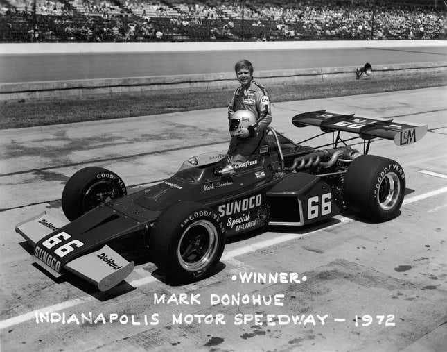 Portrait of American racing driver Mark Donohue (1937 - 1975) as he poses with his car after winning the Indianapolis 500 (Indy 500) race, Speedway, Indiana, May 1972.