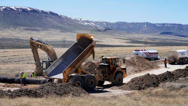 FILE - Construction continues at the Lithium Nevada Corp. mine site Thacker Pass project on April 24, 2023, near Orovada, Nev. The Reno-Sparks Indian Colony is abandoning its 3-year lawsuit aimed at blocking a lithium mine currently under construction at Thacker Pass in northwest Nevada. Tribal leaders say the U.S. Interior Department refuses to accept their arguments that the mine&#39;s on a sacred site where more than two dozen Paiute and Shoshone ancestors were massacred in 1865. (AP Photo/Rick Bowmer, File)