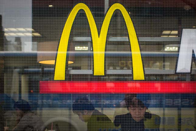 People eating at a McDonalds in Tokyo, Japan.