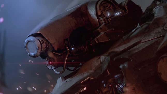 A mech head displays a red laser light. 