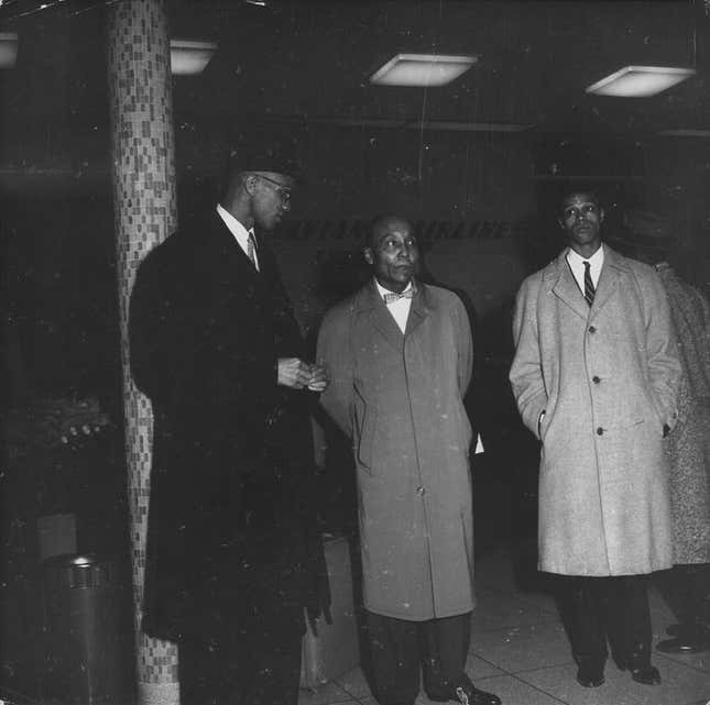 Human rights activist Malcolm X, with political leaders Elijah Muhammad and Louis Farrakhan, circa 1950-1965. 