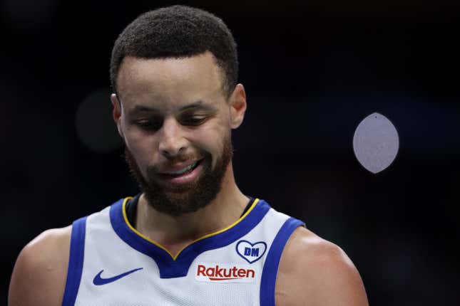 WASHINGTON, DC - FEBRUARY 27: Stephen Curry #30 of the Golden State Warriors reacts against the Washington Wizards during the first half at Capital One Arena on February 27, 2024 in Washington, DC. NOTE TO USER: User expressly acknowledges and agrees that, by downloading and or using this photograph, User is consenting to the terms and conditions of the Getty Images License Agreement. (Photo by Patrick Smith/Getty Images)