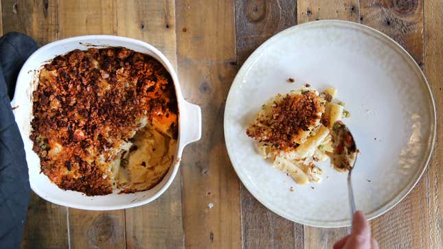 Tuna Casserole being served from a baking dish onto a plate