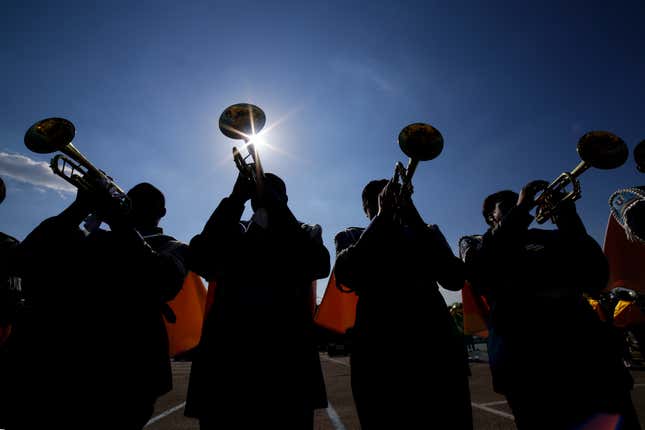 File - The Southern University Human Jukebox marching band warms up before the 2023 National Battle of the Bands at NRG Stadium, Saturday, Aug. 26, 2023, in Houston. Student loan payments resume in October after a three-year pause due to the pandemic. (AP Photo/Michael Wyke, File)