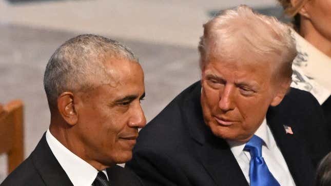 US President-elect Donald Trump speaks with former President Barack Obama as they attend the State Funeral Service for former US President Jimmy Carter at the Washington National Cathedral in Washington, DC, on January 9, 2025. 