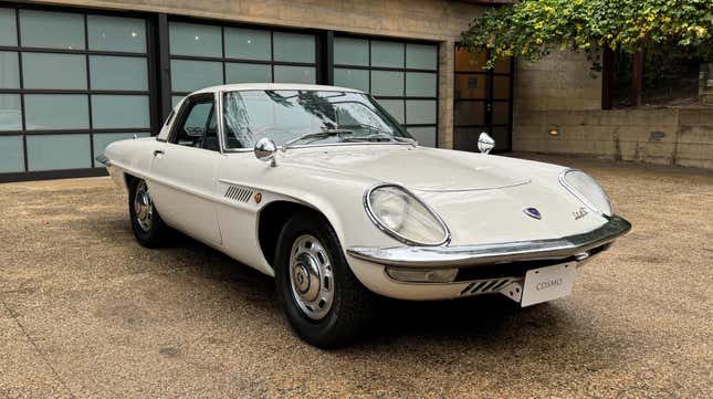 Front 3/4 view of a white Mazda Cosmo 110S
