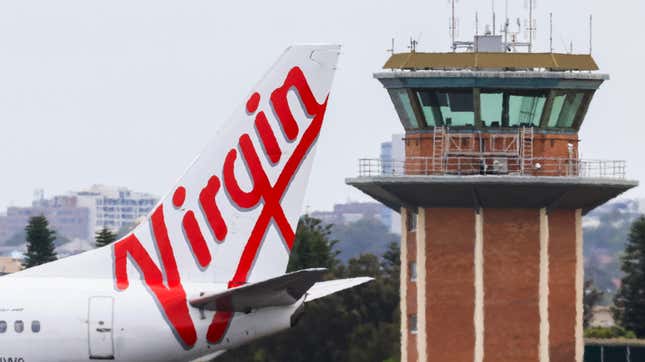 The Virgin logo displayed on an aircraft tail at Sydney Airport on January 20, 2024 in Sydney, Australia. 