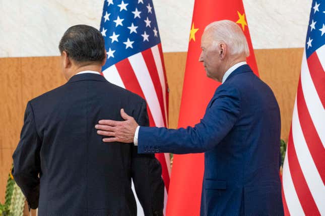 FILE - U.S. President Joe Biden, right, departs with Chinese President Xi Jinping for a meeting on the sidelines of the G20 summit meeting, Nov. 14, 2022, in Bali, Indonesia. (AP Photo/Alex Brandon, File)