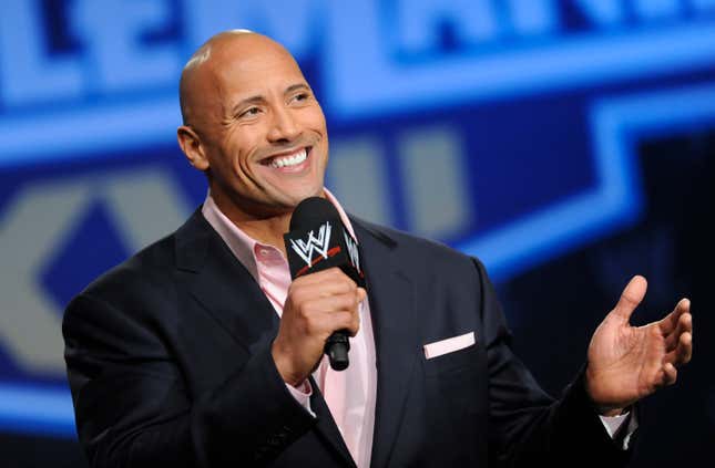 FILE - Actor and former WWE Superstar Dwayne &quot;The Rock&quot; Johnson participates in a news conference on Wednesday, Mar. 30, 2011 in New York. As WWE gears up for its biggest annual premium live event in April 2024, the company continues to harness the power of its social media presence to reach its fans. A key component of that strategy is YouTube, where WWE has hit an important milestone: reaching 100 million subscribers. (AP Photo/Evan Agostini, file)