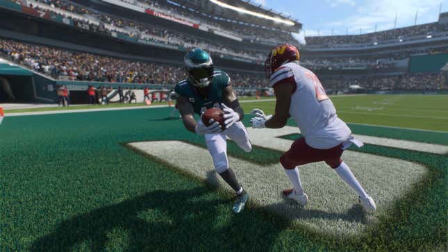 An Eagles player avoids a tackle.