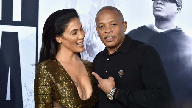 Nicole Young  and  Dr. Dre attend the premiere of “Straight Outta Compton” on August 10, 2015 in Los Angeles.