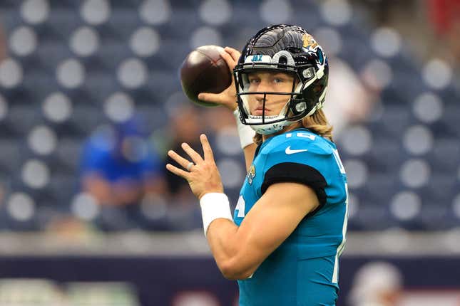 Trevor Lawrence #16 of the Jacksonville Jaguars warms up prior to the game against the Houston Texans at NRG Stadium on September 12, 2021 in Houston, Texas. 