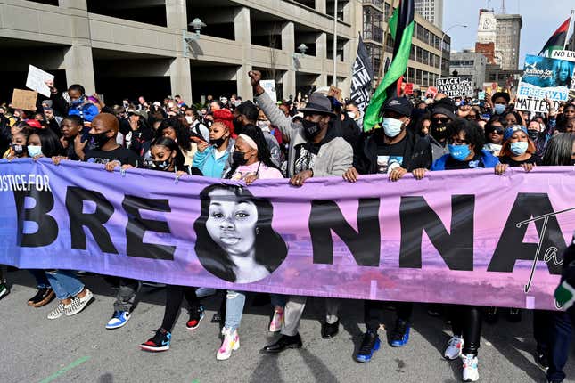 Tamika Palmer, center, the mother of Breonna Taylor, leads a march through the streets of downtown Louisville on the one year anniversary of Taylor’s death on March 13, 2021, in Louisville, Ky. Questioning of potential jurors begins Tuesday, Feb. 1, 2022, for the trial of a former Kentucky police officer involved in a botched raid that killed Taylor, a 26-year-old Louisville emergency medical technician. Brett Hankison is standing trial on three counts of wanton endangerment for allegedly firing wildly into Taylor’s neighbors’ apartments in March 2020. No drugs were found during the raid, and the warrant was later found to be flawed. 