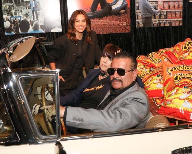 (L-R) Eva Longoria, Diane Warren and Richard Montañez the opening of the “Flamin’ Hot” exhibit at The Hollywood Museum in California.