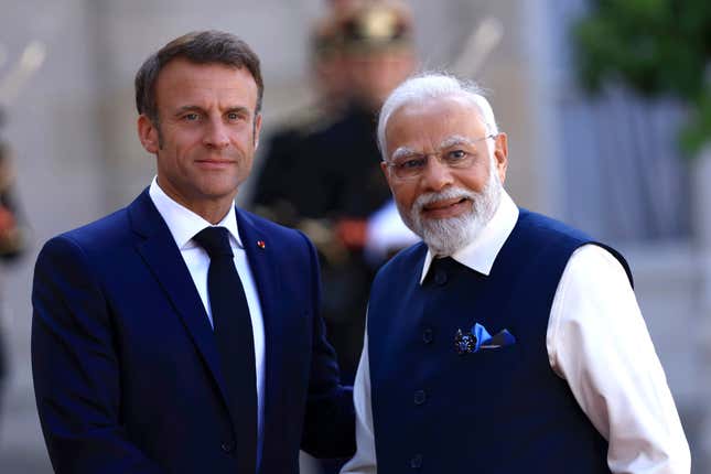 FILE - Indian Prime Minister Narendra Modi, right, and French President Emmanuel Macron pose before their talks at the Elysee Palace in Paris, Friday, July 14, 2023. India has invited French President Emmanuel Macron to be the chief guest at the country&#39;s national day celebrations next month, in what Macron&#39;s office described Friday Dec.22, 2023 as &quot;a strong moment&quot; for the two nation&#39;s ties. (AP Photo/Aurelien Morissard, File)