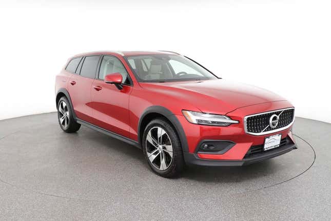 A picture of a beautiful red Volvo V60 Cross Country wagon.
