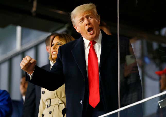 Former president of the United States Donald Trump waves prior to Game Four of the World Series between the Houston Astros and the Atlanta Braves Trust Park on October 30, 2021, in Atlanta, Georgia. 