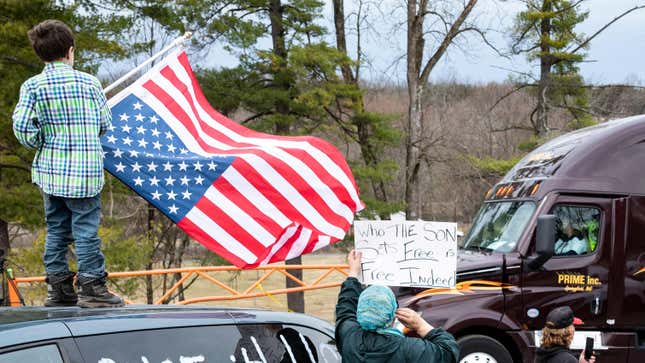 Demonstrators prepare to depart Hagerstown Speedway in Hagerstown, Maryland, on March 7, 2022, during “The People’s Convoy” event. - The convoy has called on US President Joe Biden to end vaccine and other Covid-19 pandemic mandates while modeling themselves after Canadian drivers who had occupied the center of Ottawa in a similar protest. 