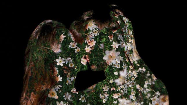 An image of a man and a woman kissing that was later made into an NFT. Their silhouettes are replaced by flowers.